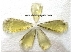 LIGHT GREEN COLOR GLASS ARROWHEAD (2 INCHES)