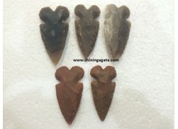 NEOLITHIC ROUND CARVED ARROWHEADS